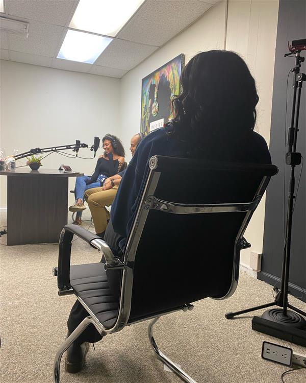 podcasting room where an interview is taking place
